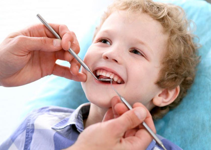 Scaling children's teeth 3