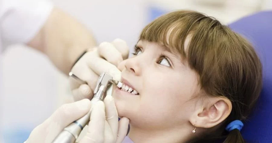Scaling children's teeth 4